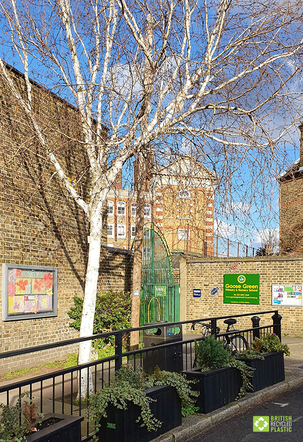 Goose Green Primary School's entrance enhanced by recycled plastic planters