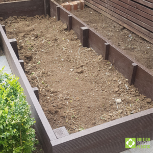 Garden to table growing. 300mm raised bed installation. After filling with compost.