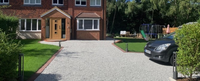 A beautifully finished permeable private drive constructed with gravel on a bed of Hebden X-Grids.