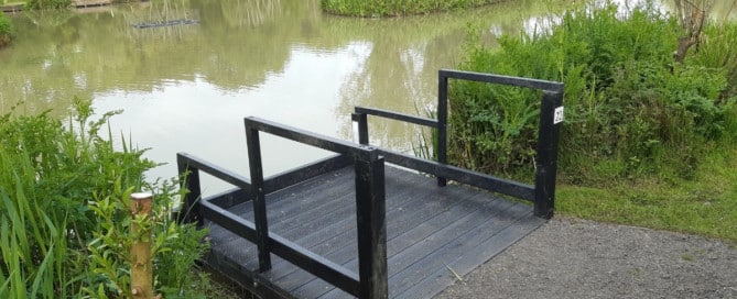 A wheelchair accessible recycled plastic fishing platform in Devon built using a design approved by the British Disabled Angling Association