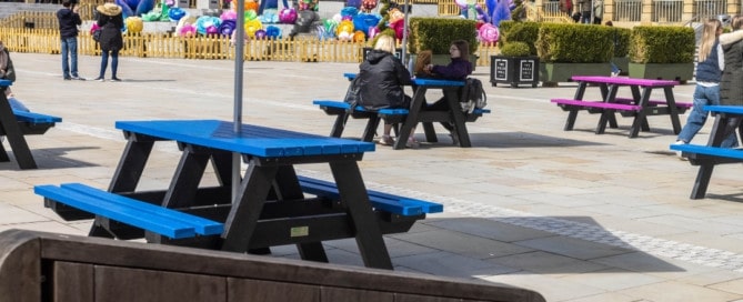 Blue recycled plastic Denholme picnic tables at the Piece Hall in Halifax