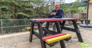 Jason Elliott at a Bradshaw wheelchair-accessible picnic table engineered from British Recycled Plastic