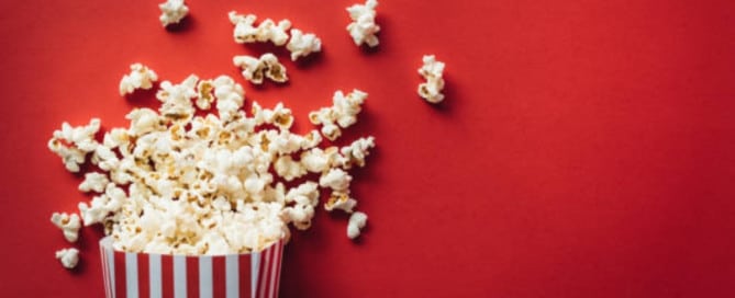 Popcorn against a red background