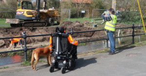 Darren and Red supervising works on the banks of the Beck