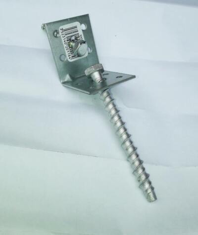 Ground fixing anchors for hard surfaces