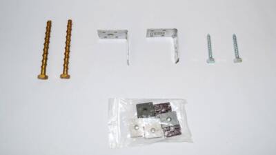 Ground fixing kits for hard surfaces