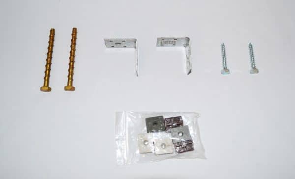 Ground fixing kits for hard surfaces