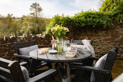British Recycled Plastic Roundhay dining set in a UK garden
