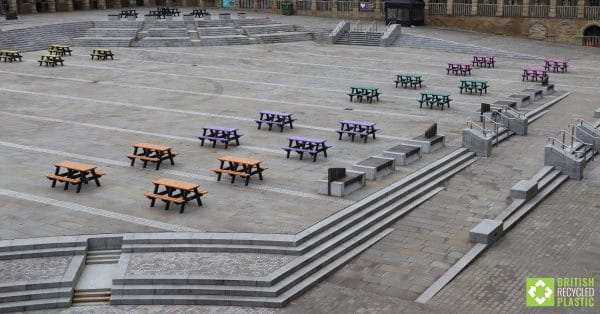 Various Denholme recycled plastic picnic tables at the Piece Hall in Halifax