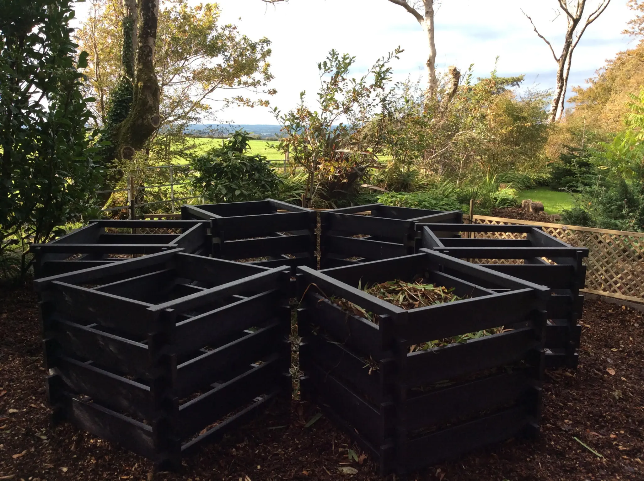 Black Redacre compost bins in garden setting. British Recycled Plastic