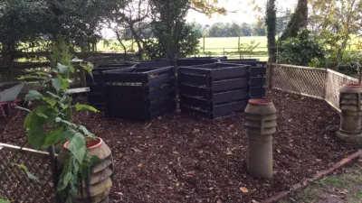 Black Redacre compost bins in garden setting. British Recycled Plastic