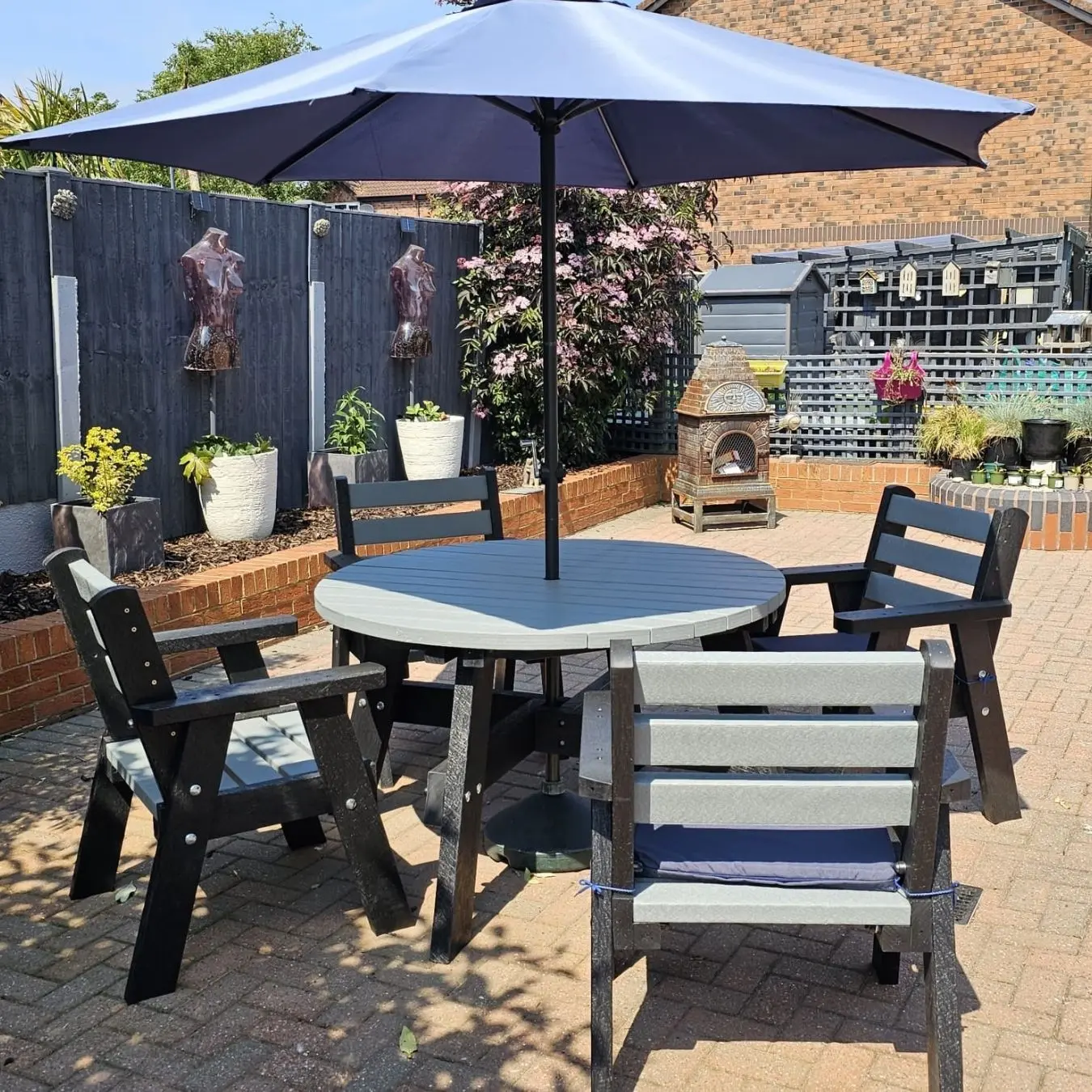 Garden dining set with umbrella. British Recycled Plastic