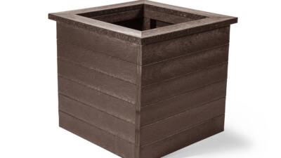 An empty Haworth recycled plastic planter in brown