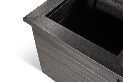 A corner detail of a Haworth recycled plastic planter in black
