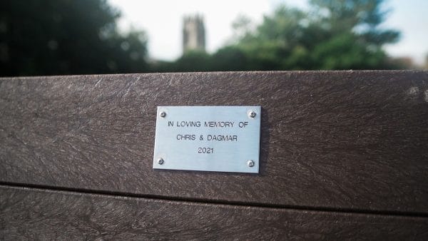 A brown recycled plastic Harewood memorial bench in Driffield