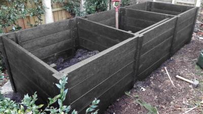 A Callis heavy duty recycled plastic triple compost bin, shown without lids