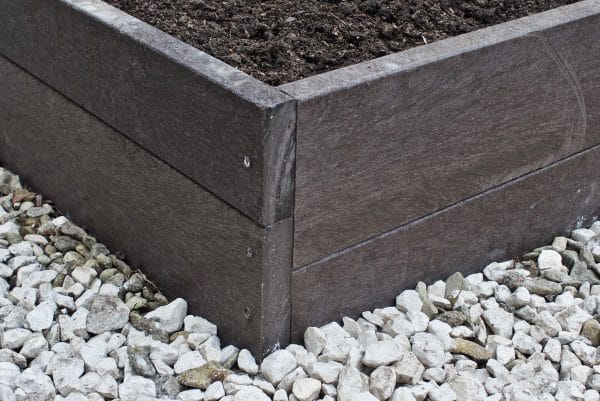 A corner detail of a recycled plastic raised bed made by one of our customers