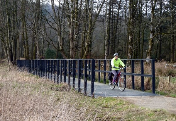 A recycled plastic boardwalk used as a cycleway over boggy land in Western Scotland