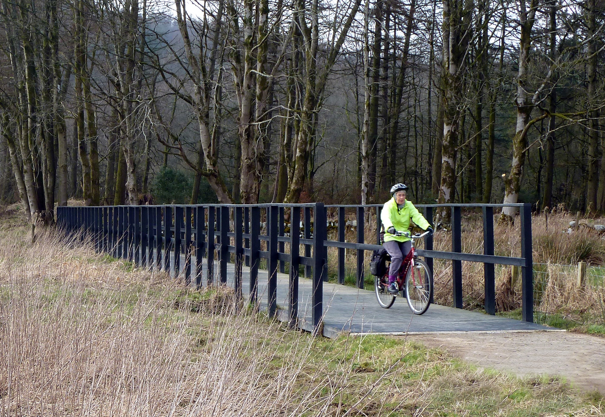 A recycled plastic boardwalk used as a cycleway over boggy land in Western Scotland