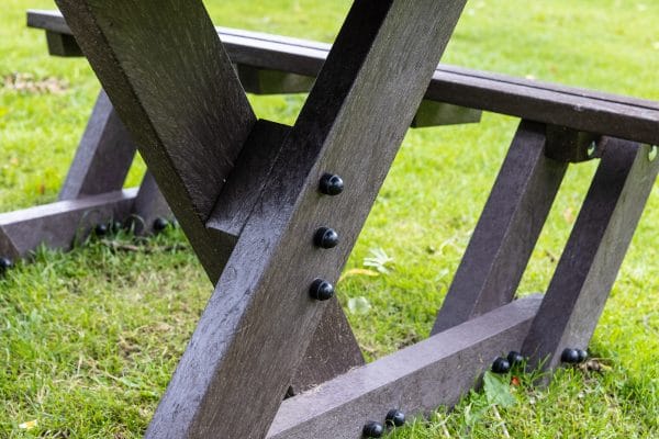 A frame detail of a Batley "walk through" picnic table at Queens Park, Bolton