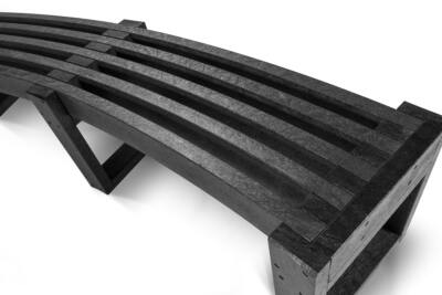 a detail of a Skipton Curved recycled plastic bench in black