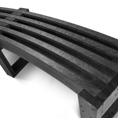 a detail of a Skipton Curved recycled plastic bench in black