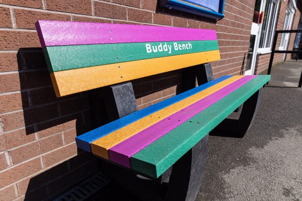 The recycled plastic Buddy Bench is very poplar with schools to help combat isolation and loneliness.