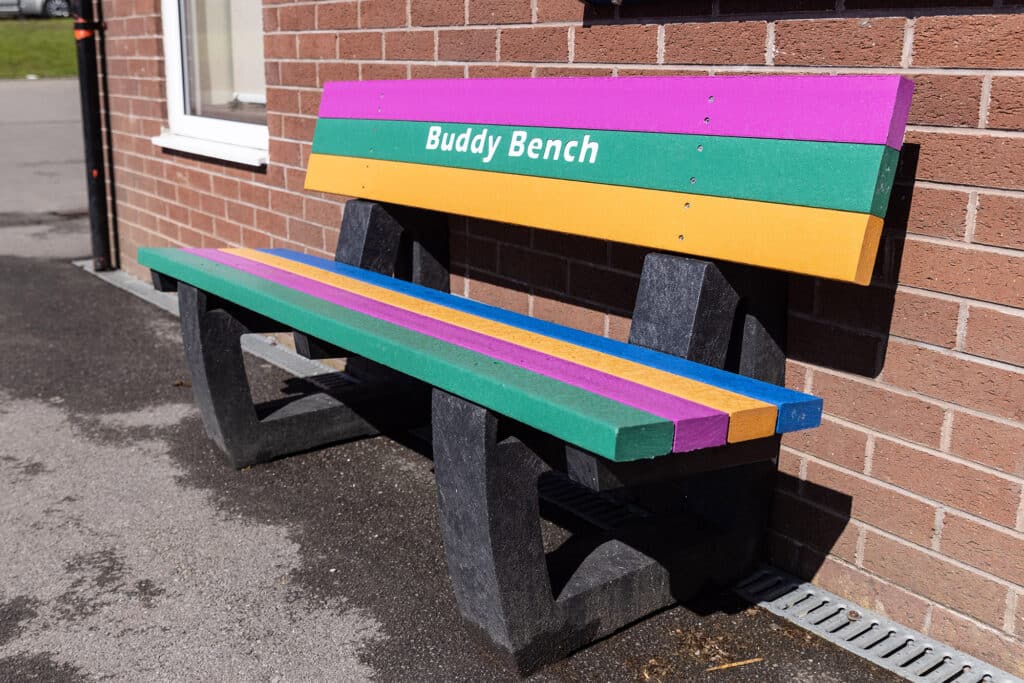 The recycled plastic Buddy Bench is very poplar with schools to help combat isolation and loneliness.