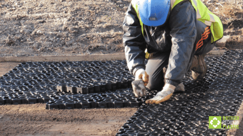 Ground Reinforcement Grids worker using