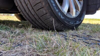 Grass growing through the Hebden X-Grid permeable pavers used in an overflow car-park