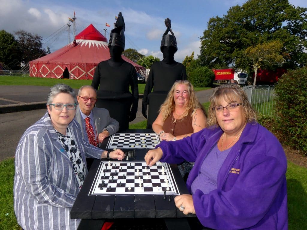 The Otley recycled plastic activity table in black, available with a variety of different tops, seen here at Victoria Park in Bideford