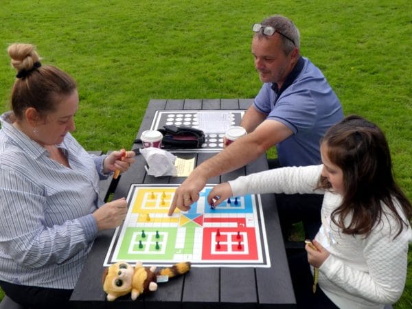The Otley recycled plastic activity table in black, available with a variety of different tops, seen here at Victoria Park in Bideford