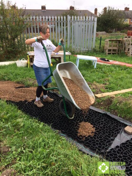 The Hebden X-Grid being used as a wheelchair and pram-friendly path at Long Eaton Community Garden