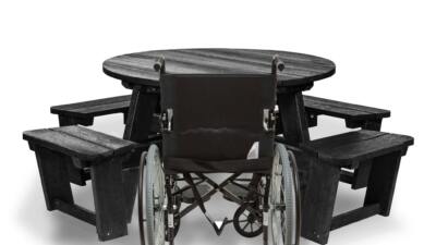 Recycled plastic circular Calder picnic table with wheelchair access in black showing chair