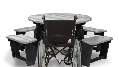 Recycled plastic circular Calder picnic table with wheelchair access in grey showing chair