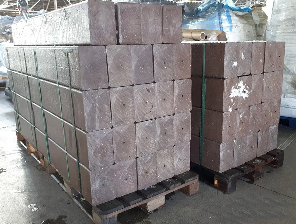 Brown british recycled plastic lumber stacked up on a trolley 