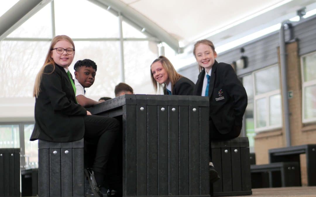 Pupils at Rastrick High School using out recycled plastic furniture