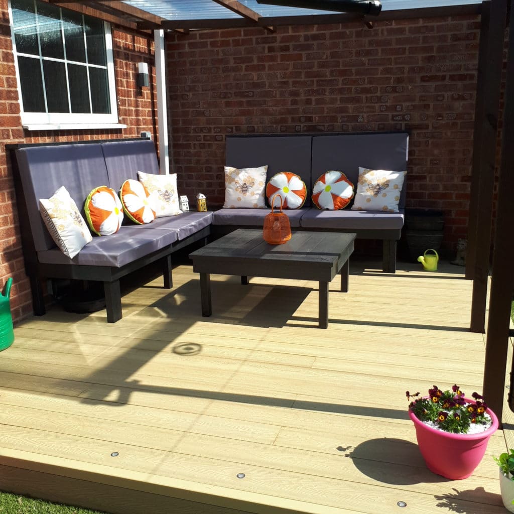 Corner table and sofa made from recycled plastic lumber