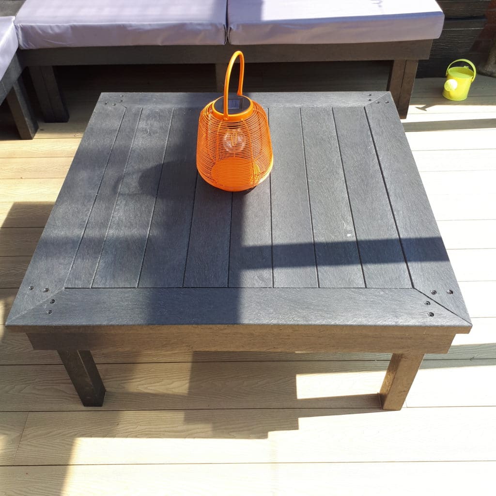 Table and sofa made from recycled plastic lumber