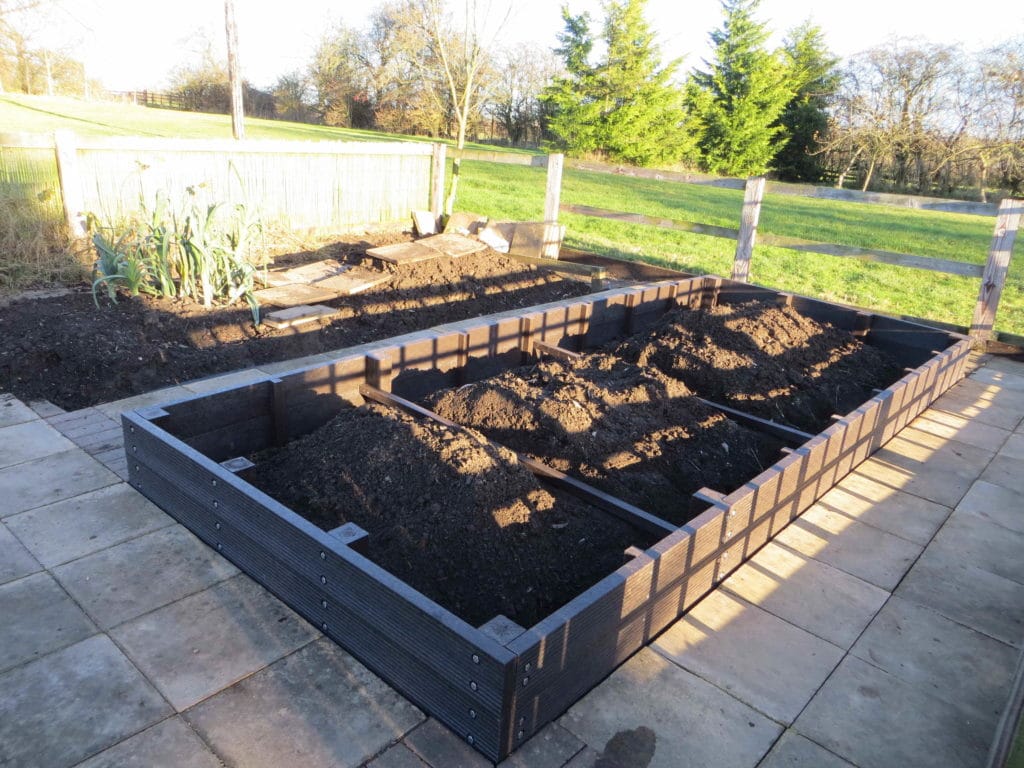 Recycled plastic raised bed