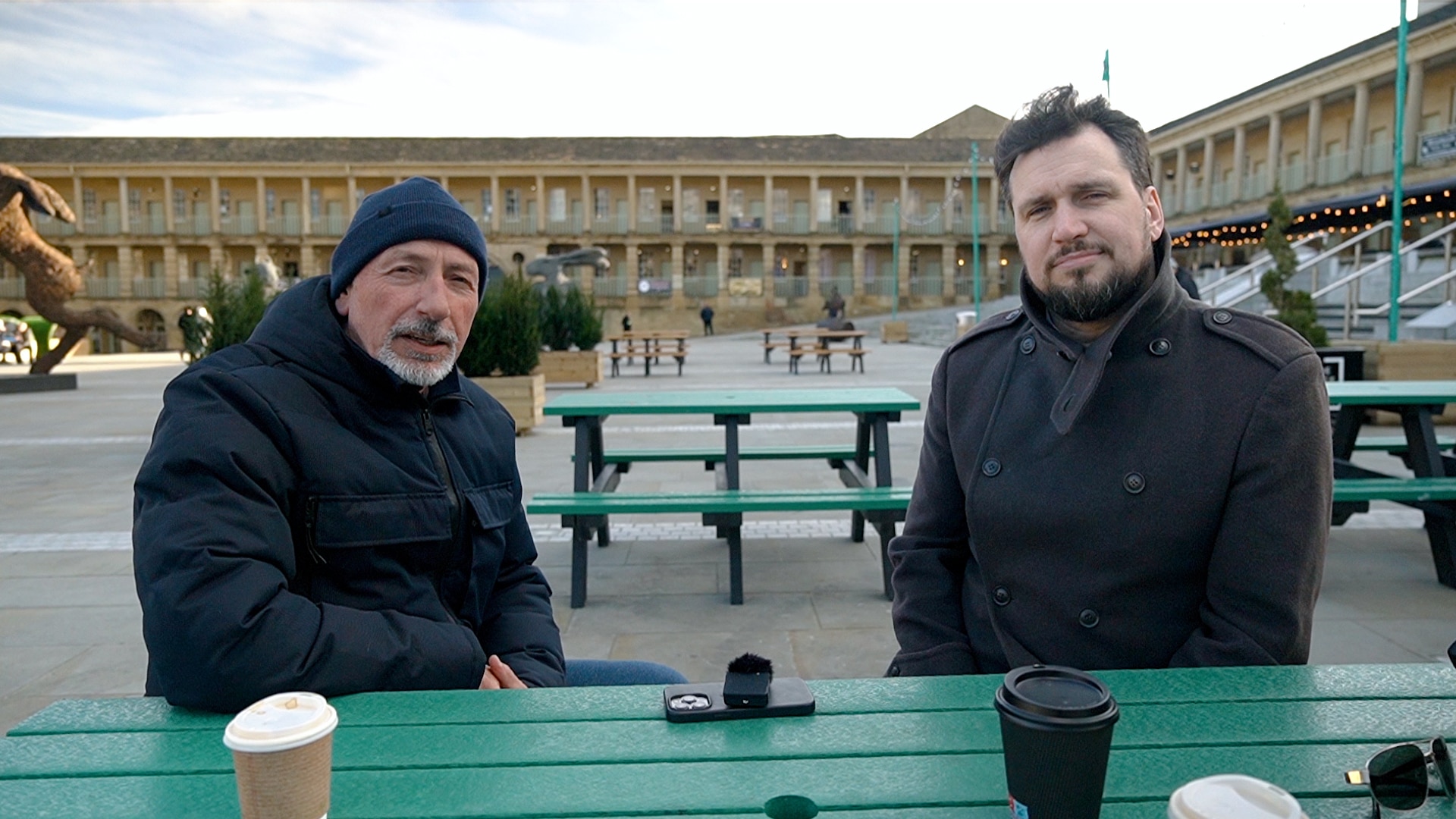 Jason and Hutch with recycled plastic picnic tables at Piece Hall