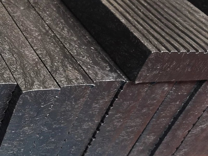 Housing Associations 9 A stack of brown recycled plastic decking