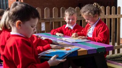 Holmfirth picnic table at Kirkham and Wesham Primary School kids reading playing and enjoying small colourful picnic table
