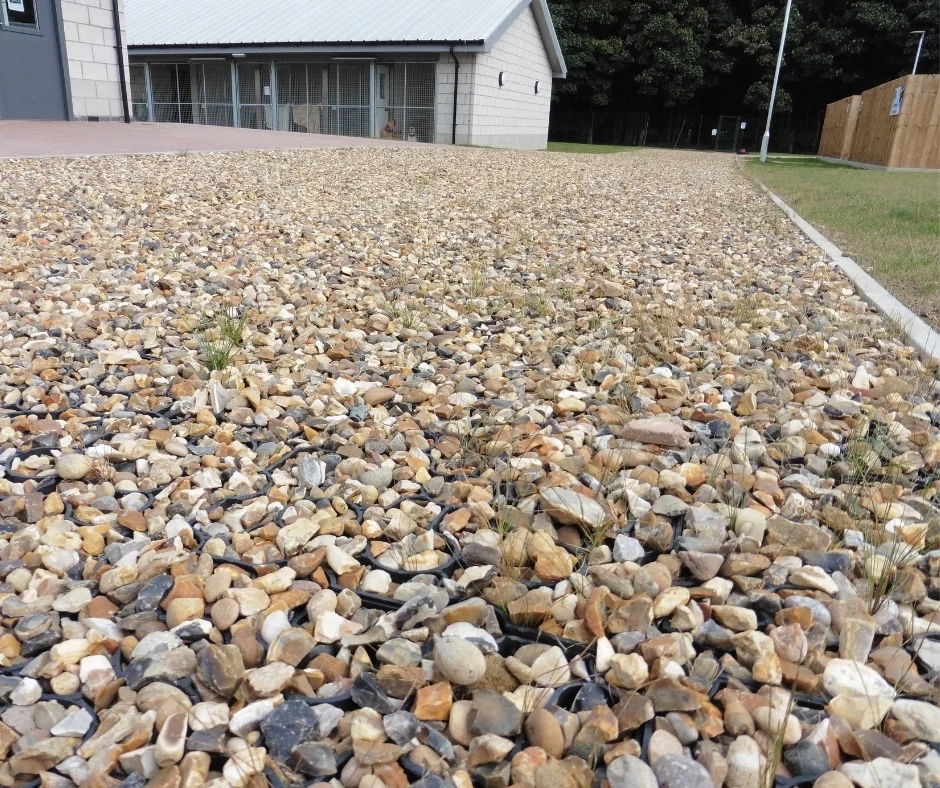 Hebden recycled plastic grids for pathways to increase accessibility, prevent flooding by allowing rain water to run through, and to keep gravel evenly laid.