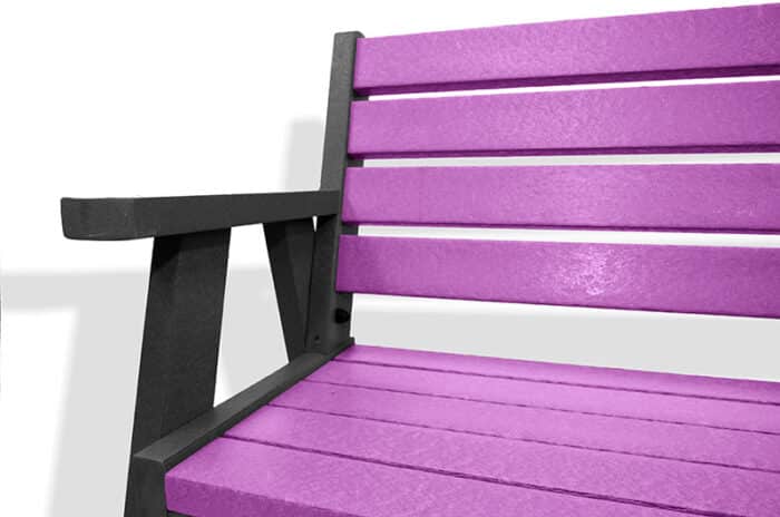 The classic recycled plastic Ilkley bench with arms, with a black frame and purple slats.