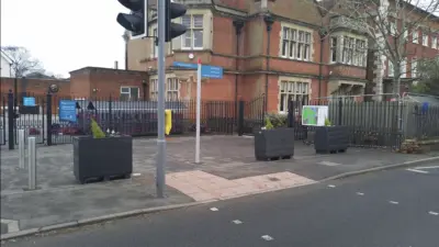 Planters near a school entrance. British Recycled Plastic Planter