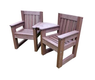 Queensbury small space outdoor seating set made from recycled plastic, featuring two durable brown chairs with a connecting corner table, designed for gardens, care homes, cafes, and small outdoor spaces.