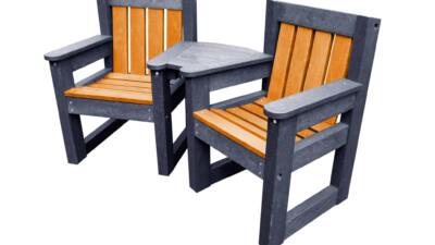 Queensbury ornage and black small garden chair set for small space outdoor seating set made from recycled plastic, featuring two durable brown chairs with a connecting corner table, designed for gardens, care homes, cafes, and small outdoor spaces.