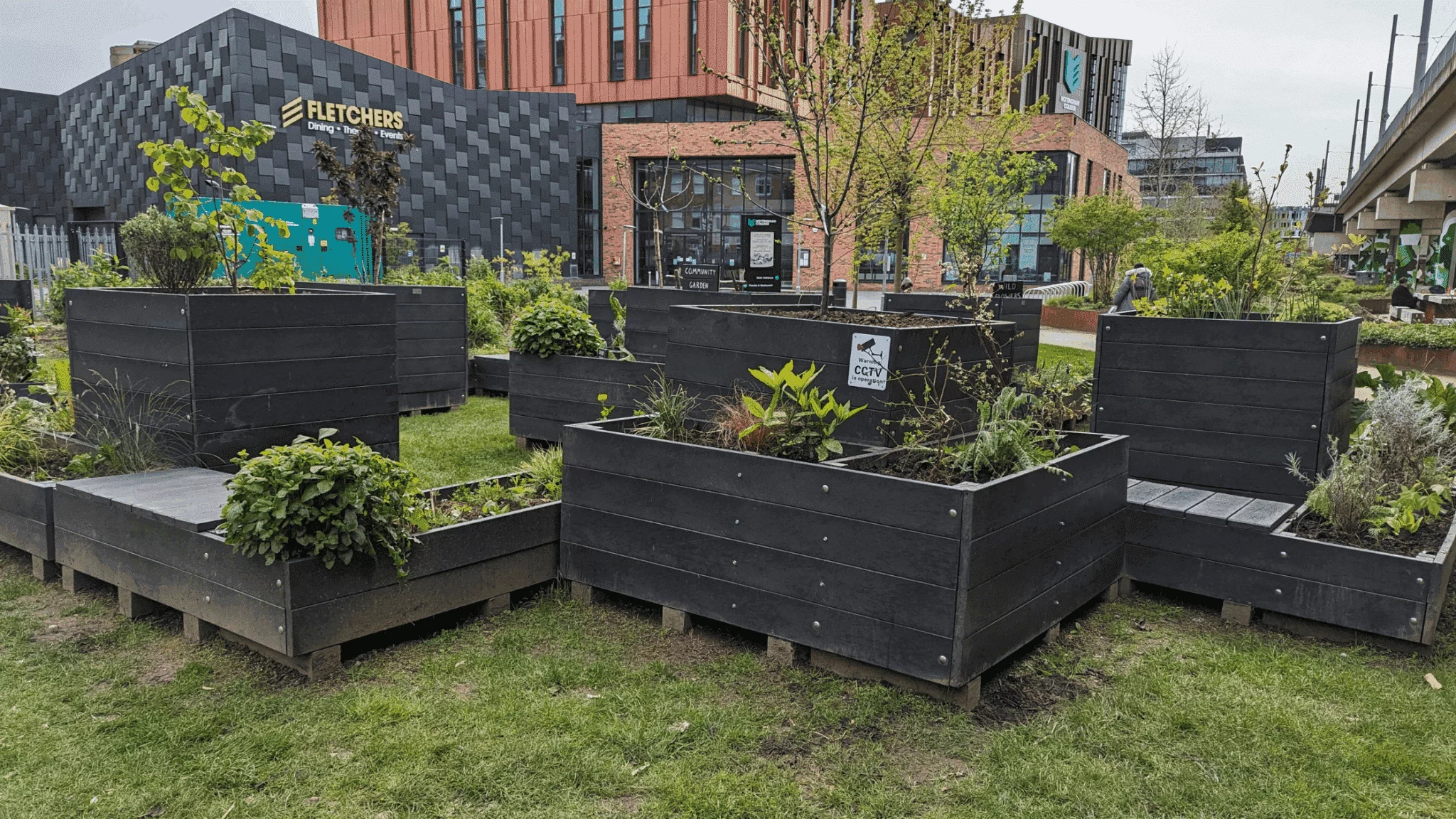 A recycled plastic parklet, combining various planters and seating, at Nottingham Trent University. A recycled plastic parklet, combining various planters and seating, at Nottingham Trent University.
