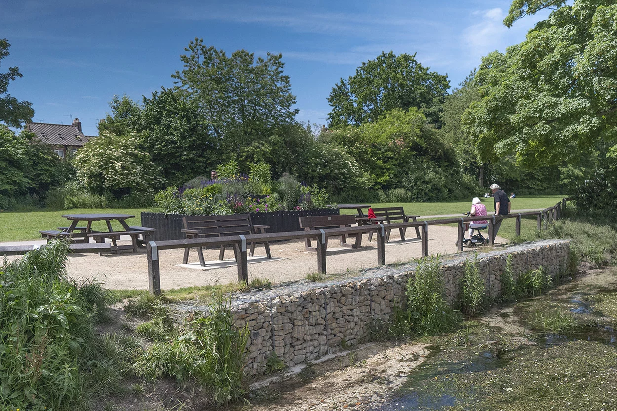 A selection of recycled plastic products, including seating and knee-rail fencing, at Driffield Beck in Yorkshire.